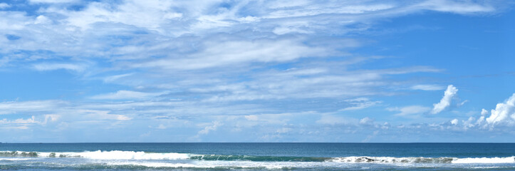 Naklejka na ściany i meble Panoramic beautiful tropical beach with blue sky.