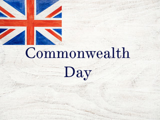 Beautiful, bright card with congratulations on the British holidays. Isolated background, close-up, view from above. Congratulations for relatives, friends and colleagues