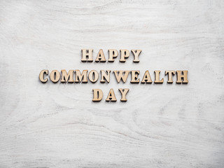 Commonwealth Day. Beautiful, bright card. Isolated background, close-up, view from above. Congratulations for relatives, friends and colleagues