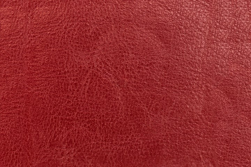 The surface and texture of old leather is red.