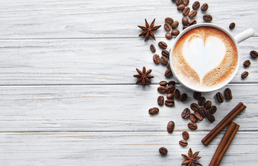 A cup of coffee with heart pattern