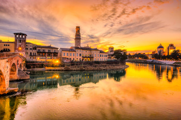 Verona, Italy. Scenery with Adige River and Ponte di Pietra, old roman bridge.  Veneto