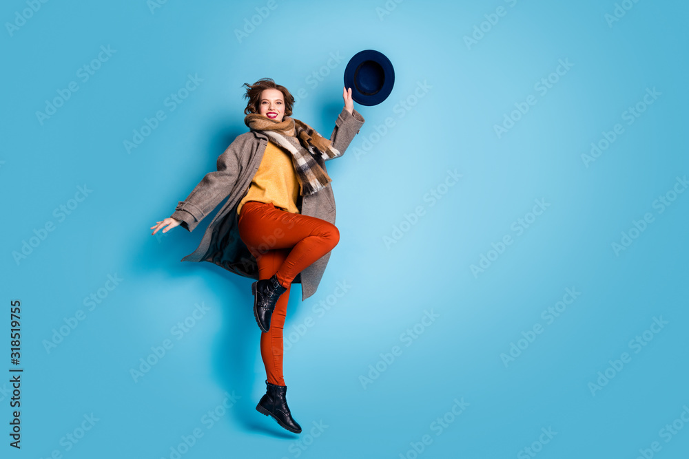 Canvas Prints Full length profile photo of amazing lady jumping high good mood rejoicing nice day wear casual long grey coat scarf trousers retro cap shoes isolated blue color background