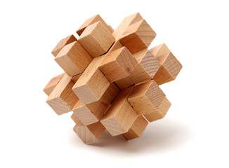 wooden puzzle over white background