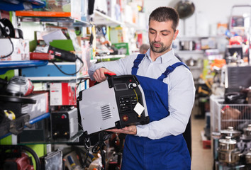 Man choosing welding transformer
