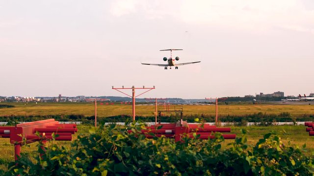 Washington, DC USA - Airport commercial airlines at golden hour. Takeoffs and landings during summertime. Washington DC, Ronald Reagan Washington National Airport DCA. Travel flight