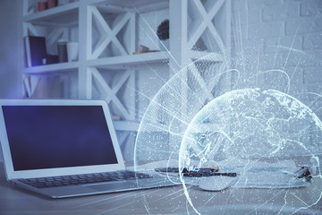 Computer on desktop with social network hologram. Multi exposure. Concept of international people connections.