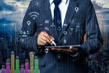 Double exposure businessman using digital technology interfaces icon .	