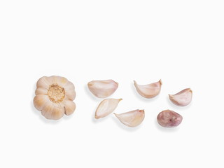 view of fresh Garlic slices isolated on white background.