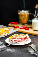 Sugar free homemade strawberry cheese roll, healthy food, proper nutrition dessert with fruit. Coffee with milk and pastry for breakfast