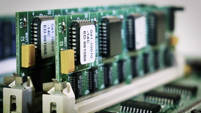 Close-up focus change video of vintage pcb, electronic parts, RAM. 4k