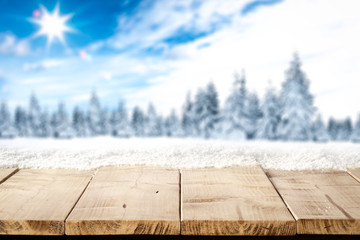 Desk of free space and blurred background of winter landscape 