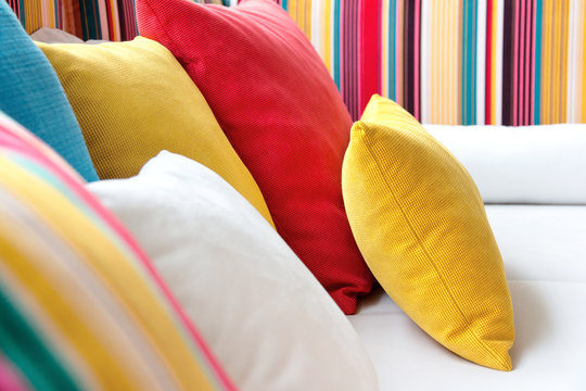 Close-Up Of Cushions On Sofa At Home