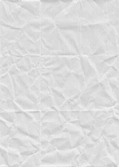 White kraft paper folded and wrinkled. Seamless pattern with a texture of folded and crumpled white kraft paper.
