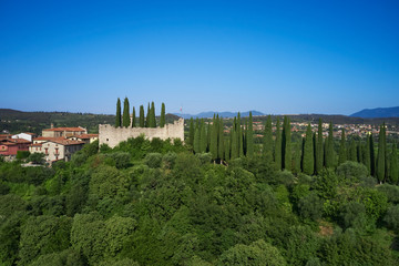 Fototapeta na wymiar Aerial view of Castle Soiano, Lake Garda Italy. Blue sky. Italian castle