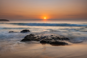 Fototapeta na wymiar Pretty Pastel Summer Sunrise by the Sea