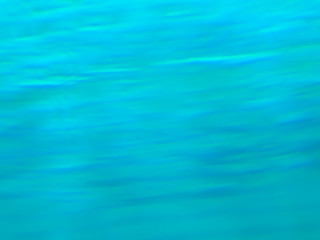 Blurred blue and green background in the form of waves