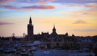 Twilight sky view of Seville, Spain city and Old Quarter skyline in a sunset sky scene
