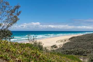 Fototapeta na wymiar Seventy-Five Mile Beach on Fraser Island, Queensland, Australia, seen from Indian Head headland which marks both the most easterly point on the island and the northern end of 75 Mile Beach.