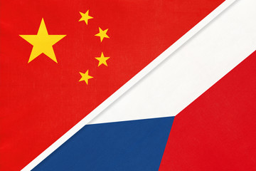 China or PRC vs Czech Republic national flag from textile. Relationship between asian and european countries.