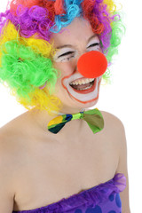 Woman dressed in clown costume for carnival is silly and funny