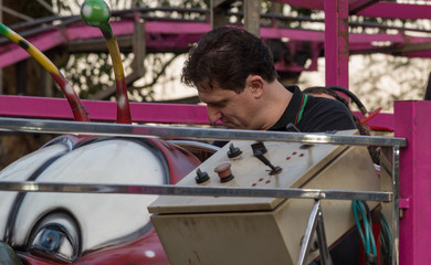 Boy, Caucasian, Playing in Toy, Carousel, Amusement Park