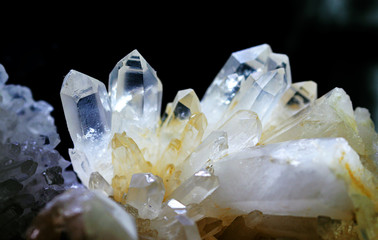 Texture of gemstone rhinestone closeup as a part of cluster geode filled with rock Quartz crystals.