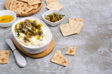 Soft cheese with olives