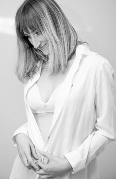 Pretty woman posing with white shirt