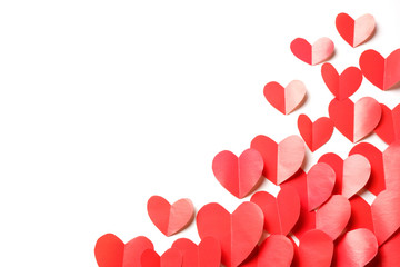 Cut out of red paper hearts on white background isolated.