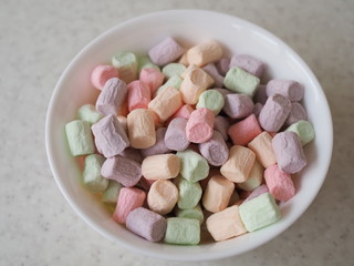 a group of mini marshmallows on white