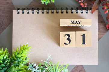 May 31, Appointment date with number cube design for background.	