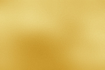 Gold metal texture background. Golden shiny metallic plate textured flat surface with smooth light...
