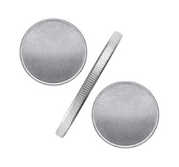 Percentage sign made up of the three coins on white background.
