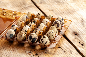 quail eggs on wooden table