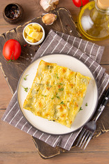 Italian cannelloni pasta with ricotta and spinach, traditional delicious food with cheese