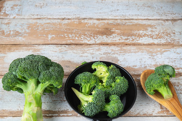 Fresh Broccoli is prepared in the kitchen.