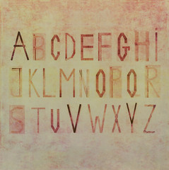 The alphabet on textured background image. Useful design element. 