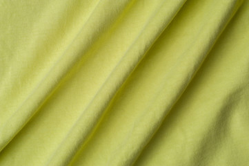 Fragment of a beautiful yellow cotton fabric