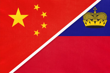 China or PRC vs Liechtenstein national flag from textile. Relationship between asian and european countries.