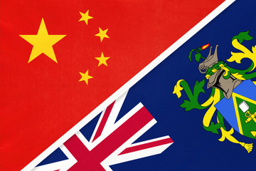 China or PRC vs Pitcairn Islands national flag from textile. Relationship between asian and european countries.