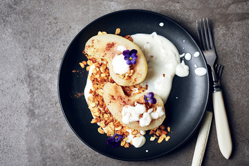 Poached pear with yogurt  and granola.