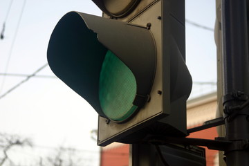 a green traffic light allows vehicles to move
