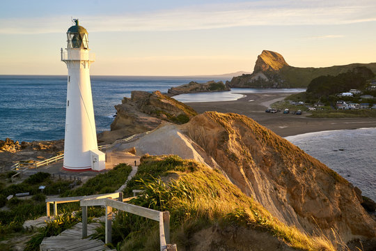 Castlepoint Lighthouse, Wairarapa, New Zealand at sunset