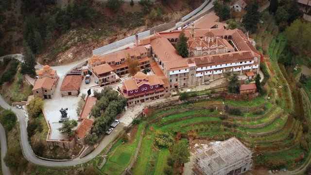 Aerial view of Machairas Monastery in Cyprus Mountains. Beautiful view of old religious mediterranean architecture in green nature landscape