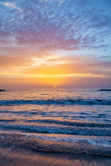 Obraz premium beautiful sunset on the sea and sand beach 