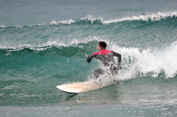 Korean Winter surfers at the Buheung-ri beach in Namjeong-Myeon, Yeongdeok-gun, South Korea.