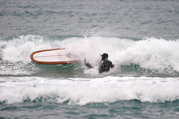 Korean Winter surfers at the Buheung-ri beach in Namjeong-Myeon, Yeongdeok-gun, South Korea.