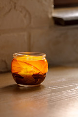 Aromatic candle in a glass jar