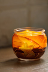 Aromatic candle in a glass jar